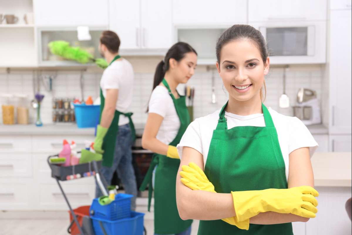 Cleaning service team at work in kitchen (R) (S)