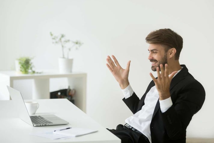 Happy company ceo satisfied with online achievement looking at l