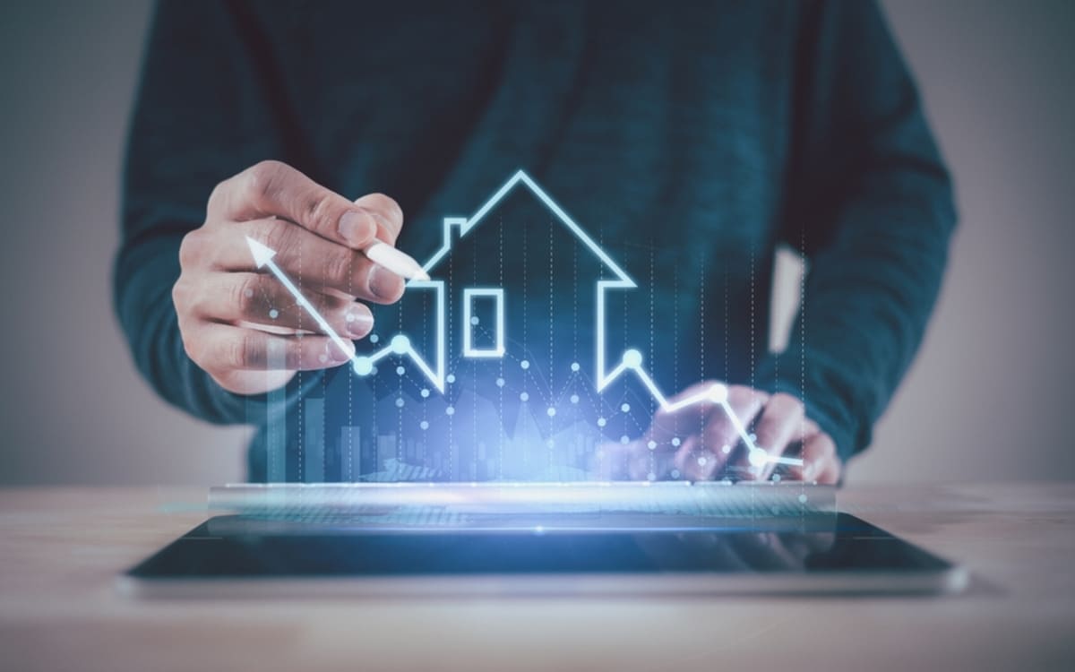 Real estate investment success represented by 3D graph with a house going upward